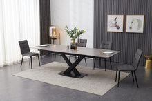 Load image into Gallery viewer, ceramic grey extending table with 6 grey faux leather chairs
