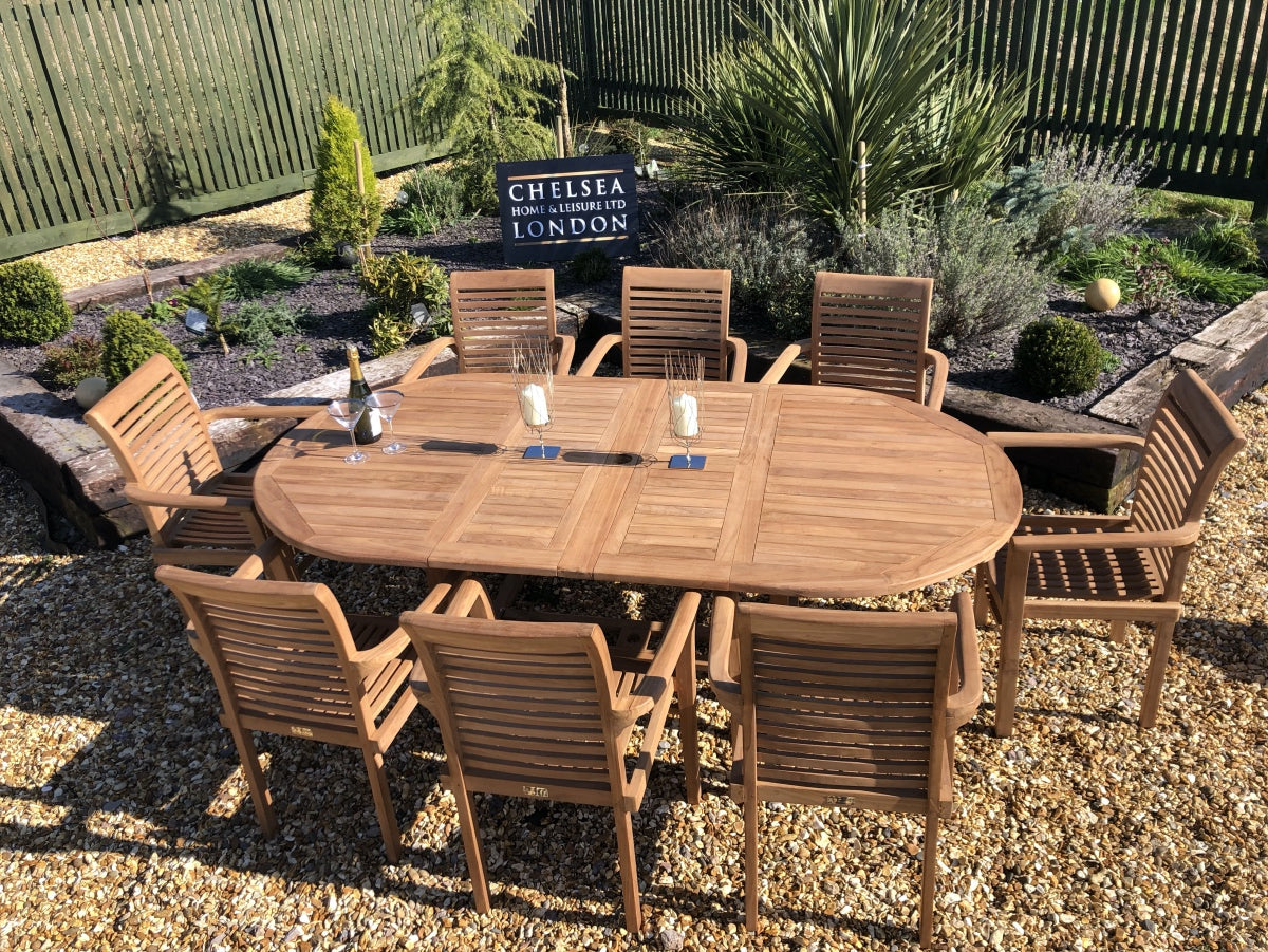 Luxury Extending Teak Table With 8 Stacking Teak Chairs