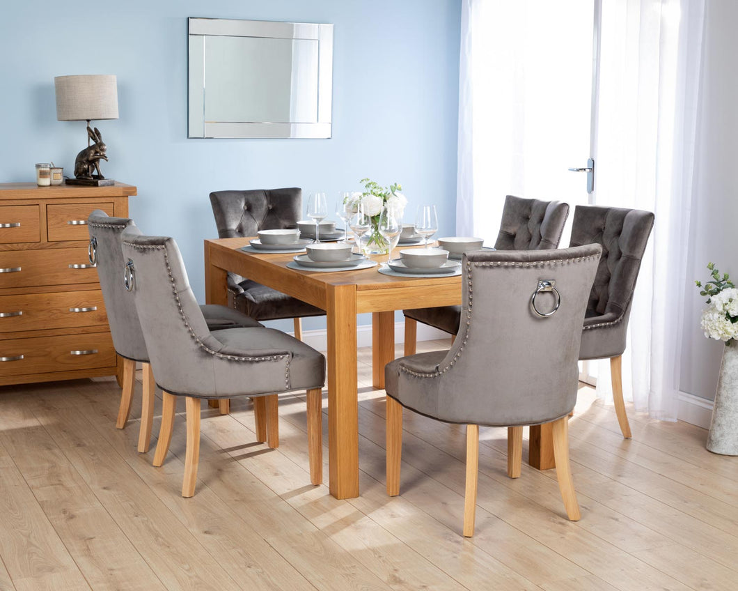 Rectangular Oak Dining Table and 6 Grey Velvet Verona Dining Chairs with Chrome Knocker and Oak Legs
